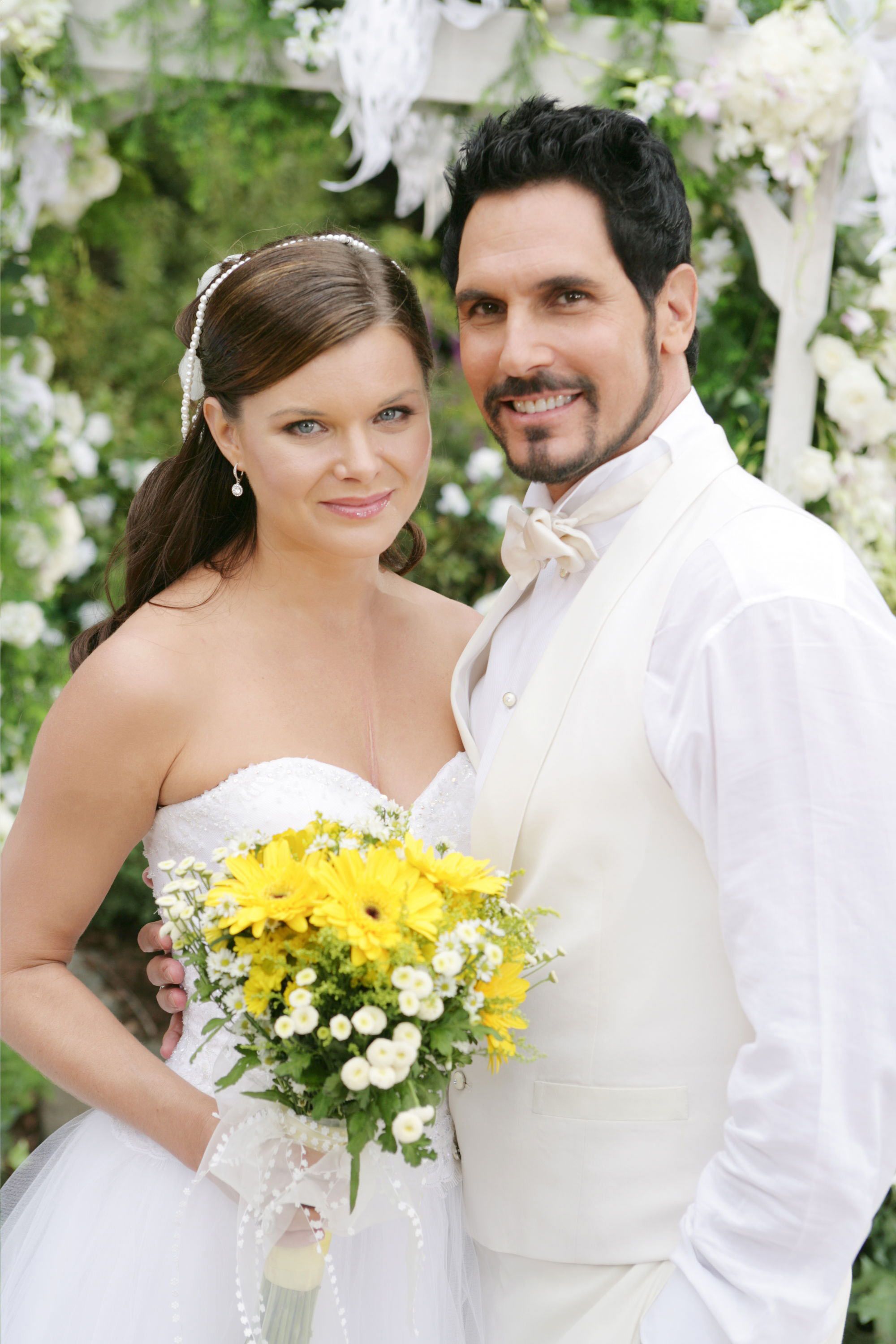 Heather Tom and Don Diamont in TV wedding for a soap opera.