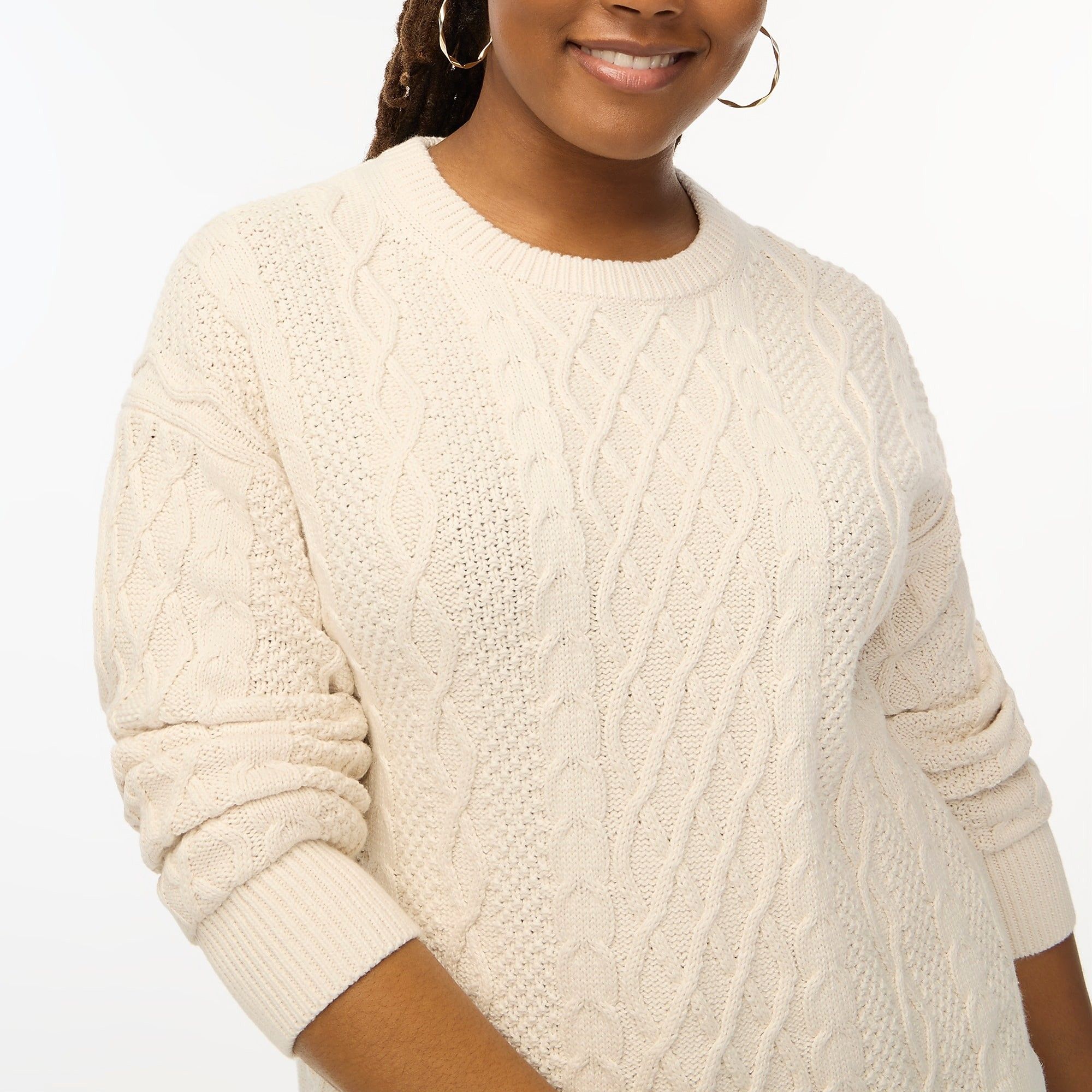 https://www.brit.co/white-cable-knit-sweaters/