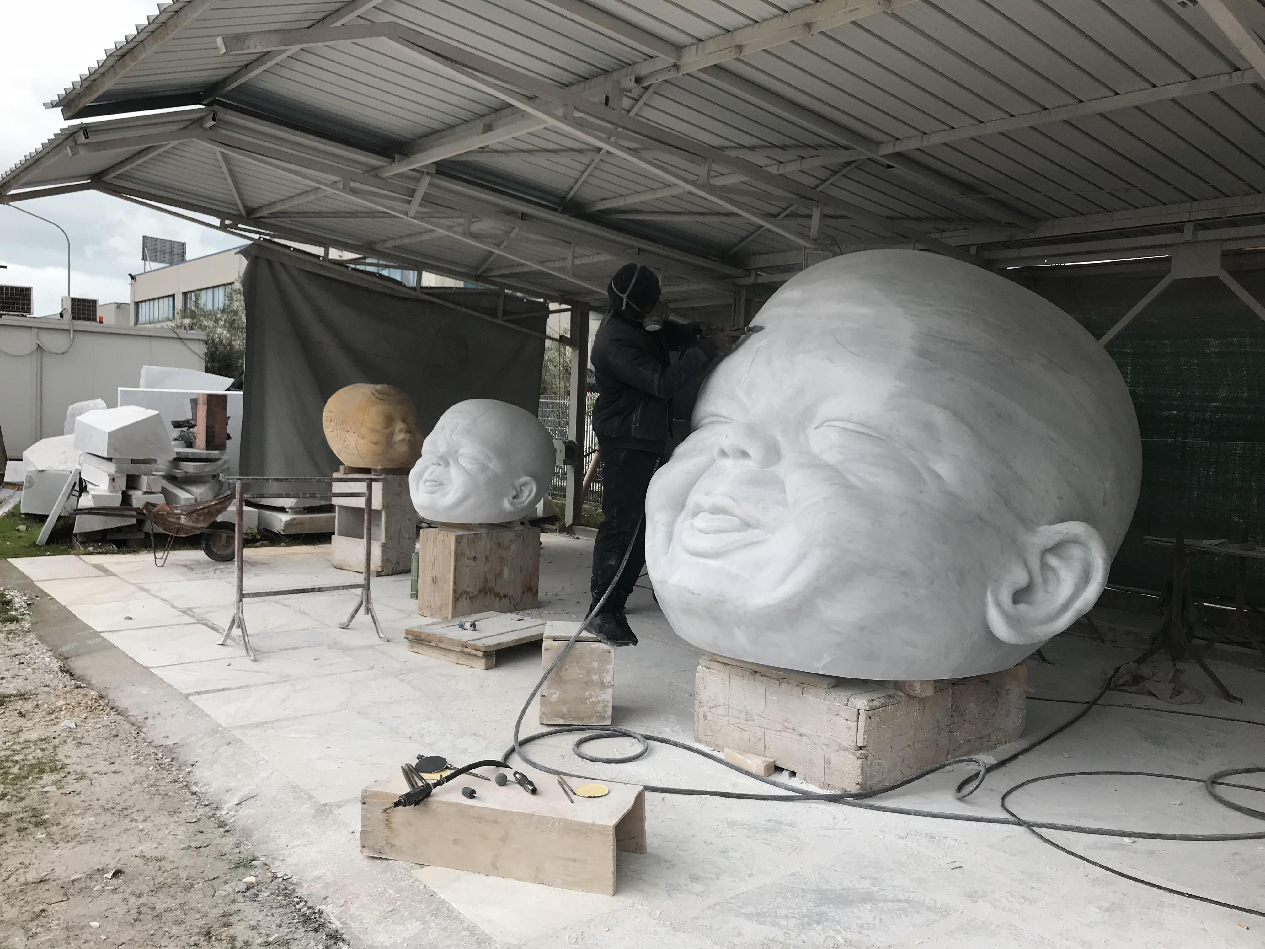 An image of the artist Brice Esso at work.