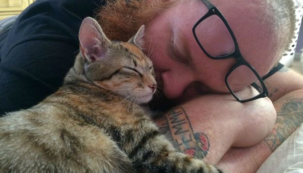 Man Saves Warehouse Kitten and Becomes Her Forever Cuddle Buddy