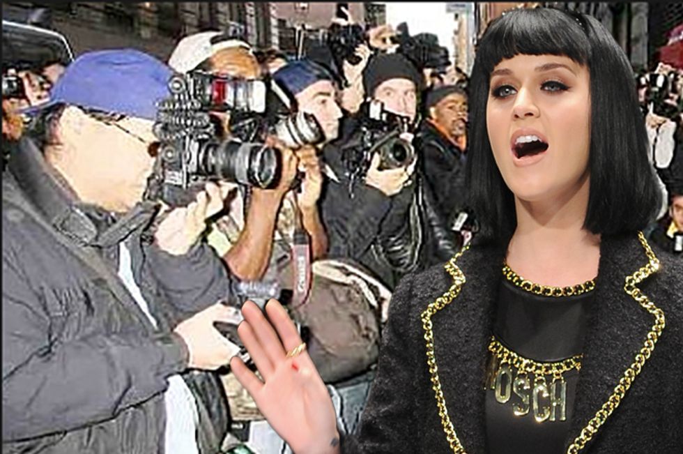 Katy Perry Booed At Airport—Assistant Furiously Fights Off The Paparazzi