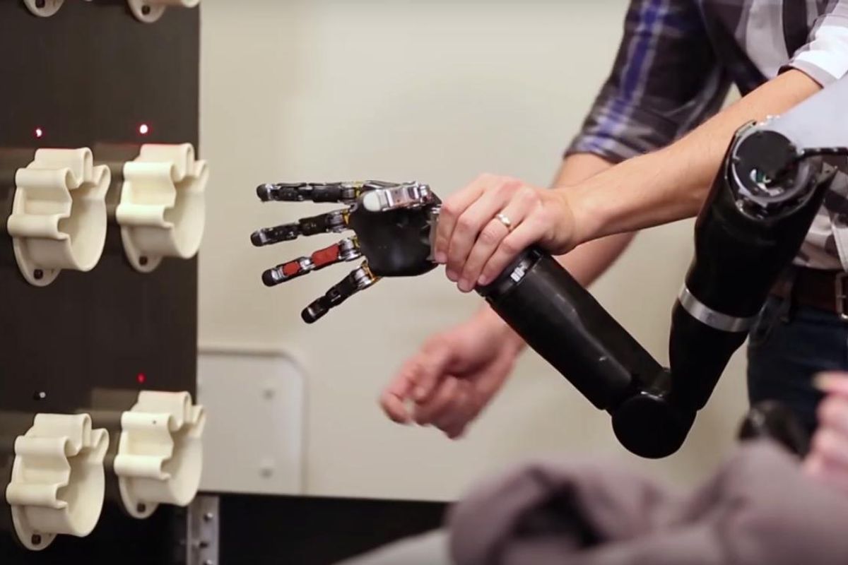 Watch The Robotic Arm That Fist-Bumped POTUS