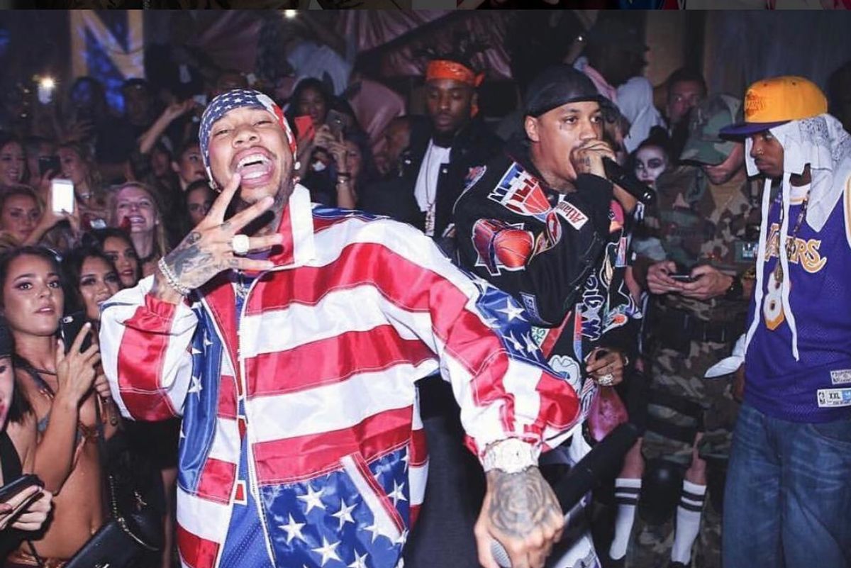 Tyga is finally paying his debt