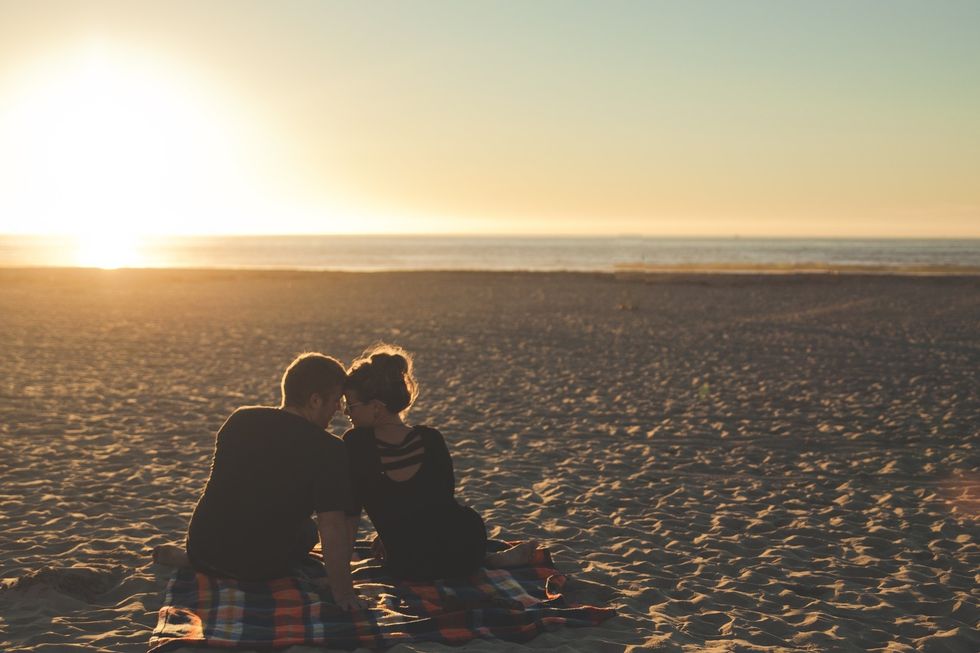https://www.pexels.com/photo/sunset-beach-couple-love-58572/