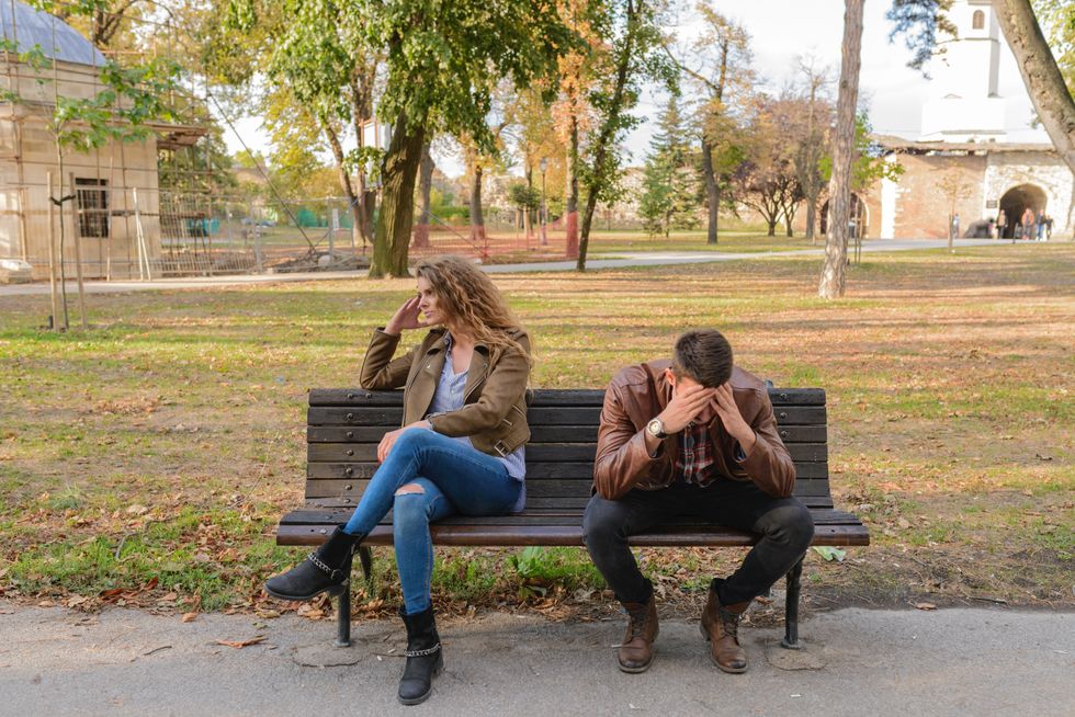 https://www.pexels.com/photo/woman-and-man-sitting-on-brown-wooden-bench-984949/
