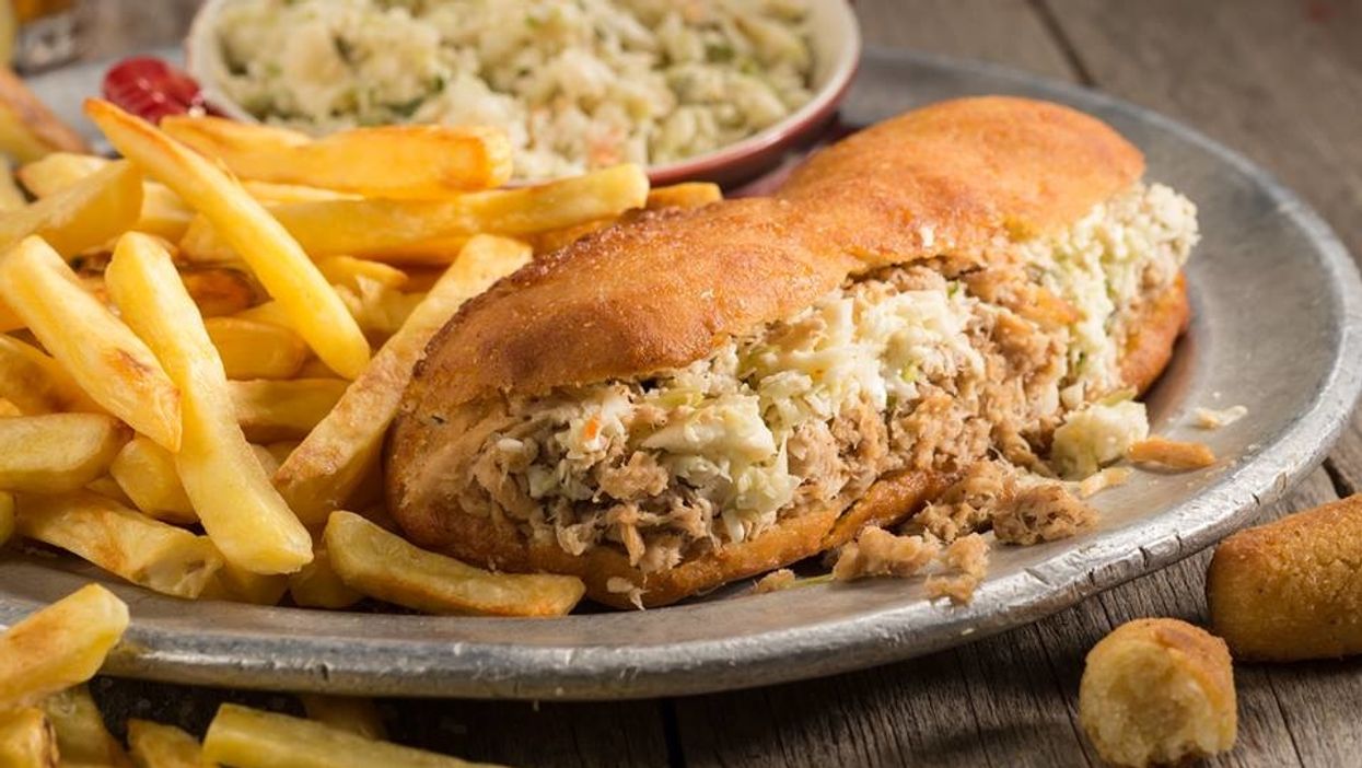 You can eat pulled pork on a sandwich made with hush puppy buns at this North Carolina restaurant
