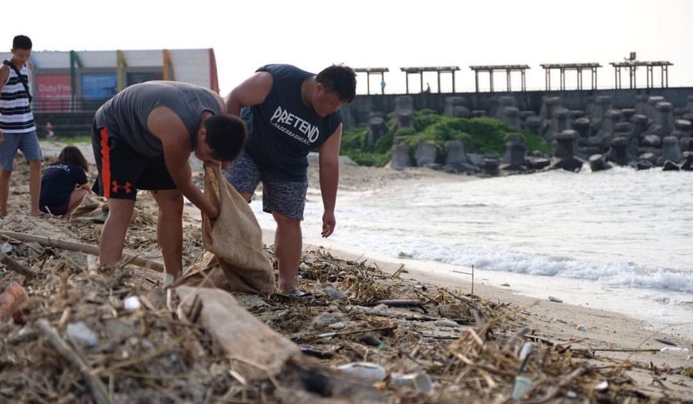 two, men, cleaning, trash, beach