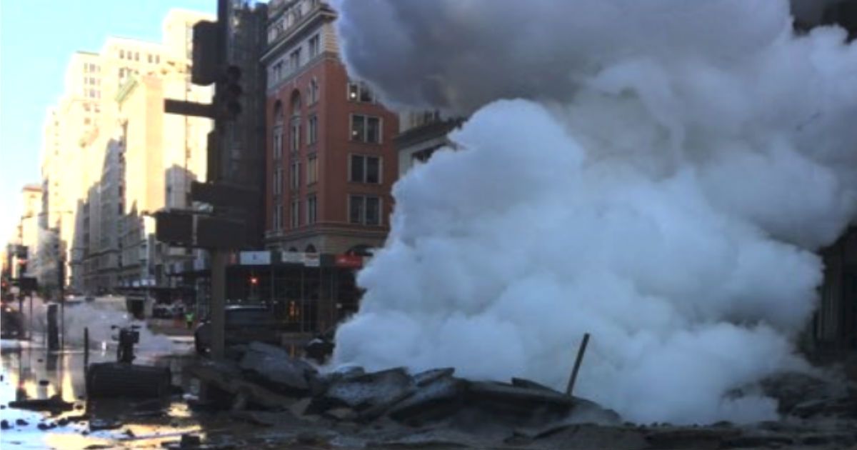 A Steam Pipe Burst In NYC's Flatiron District, Leaving A Massive Crater In The Street ðŸ˜®