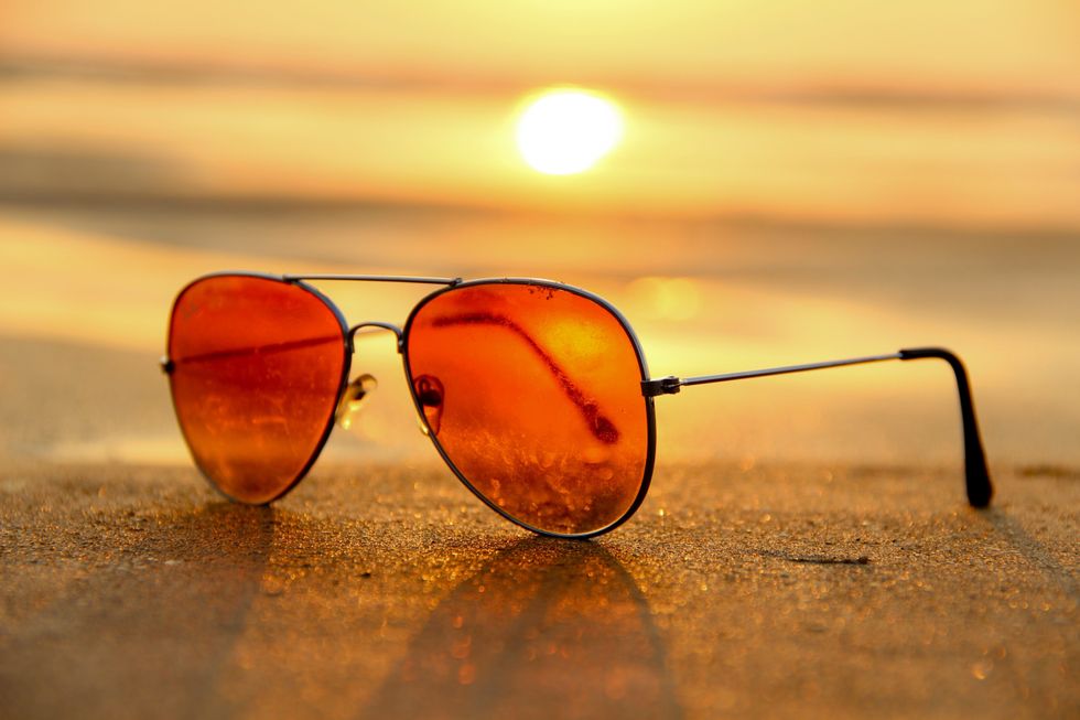 https://www.pexels.com/photo/sunglasses-sunset-summer-sand-46710/