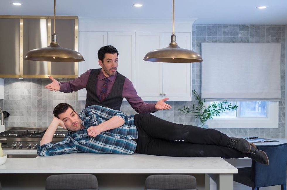 The "property brothers" posing for a picture
