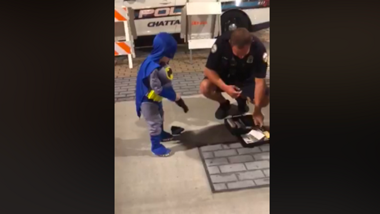 Chattanooga police officer helps little boy dressed as Batman track The Joker in adorable video