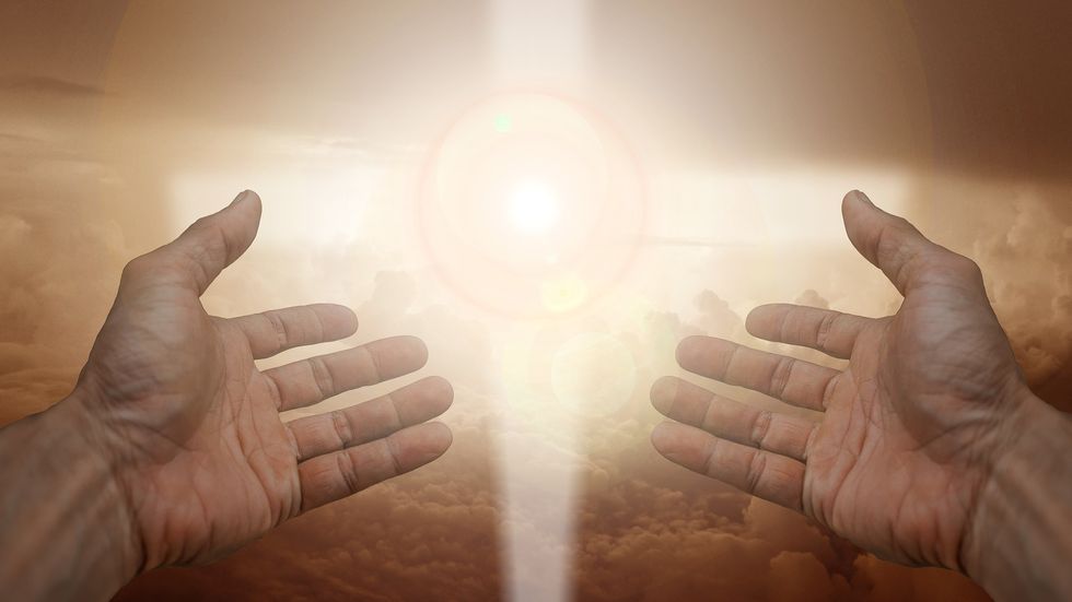 https://pixabay.com/en/religion-faith-cross-light-hand-3452571/