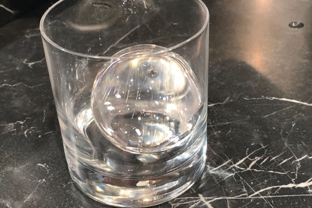 Watch this ice press melt a perfect sphere in seconds