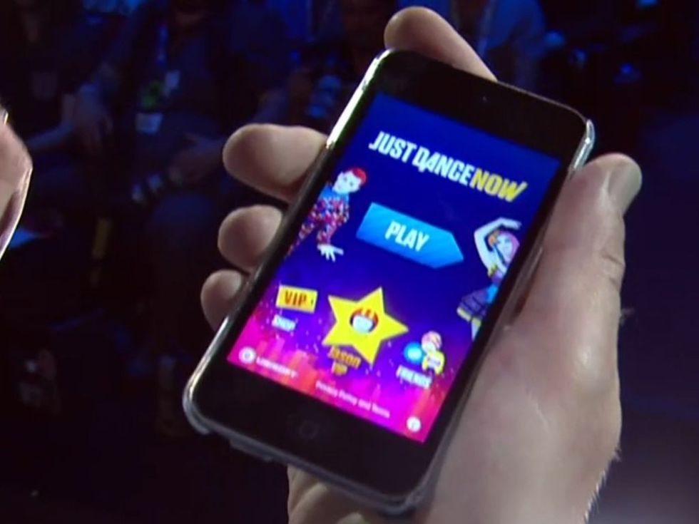 a photo of the smartphone showing the Just Dance Now app