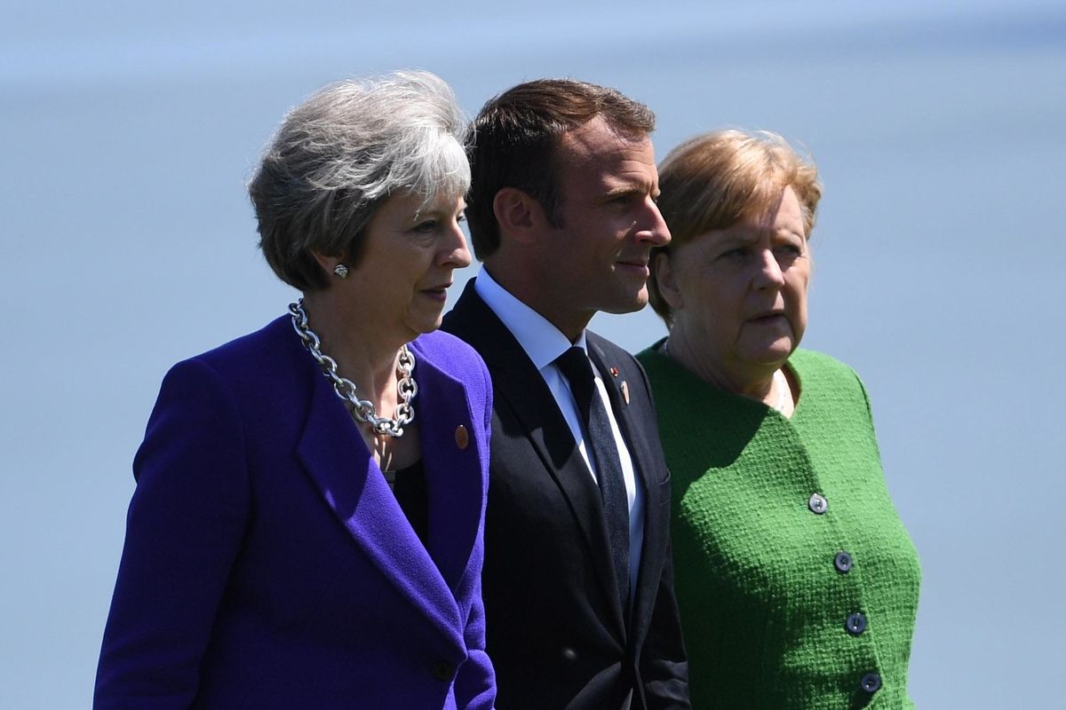 May, Macron e Merkel contro Trump si fanno male. Ma noi di più