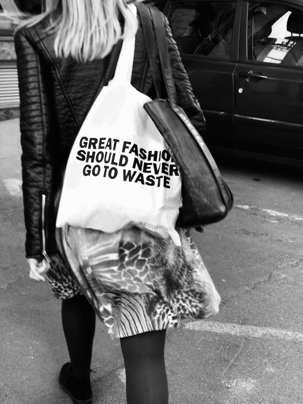 https://www.pexels.com/photo/grayscale-photography-of-woman-carrying-a-bag-2097472/