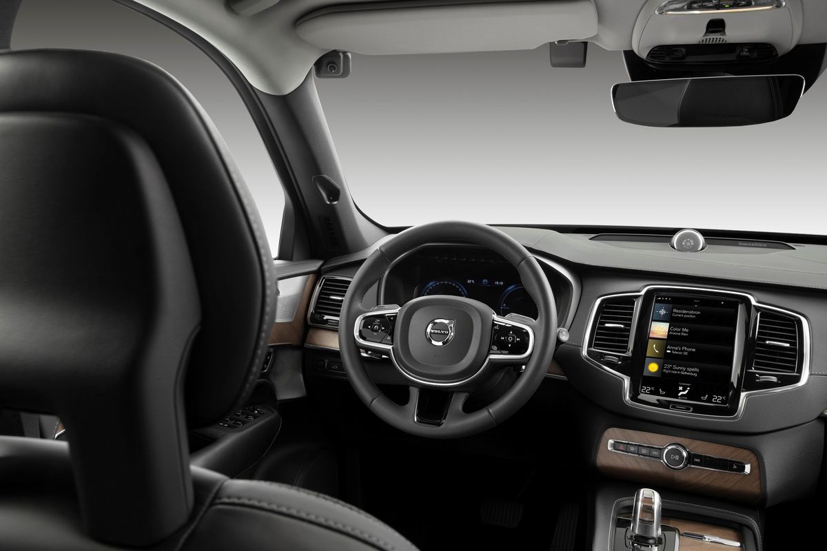 Photo of the interior of a Volvo car, showing a driver-monitoring camera system