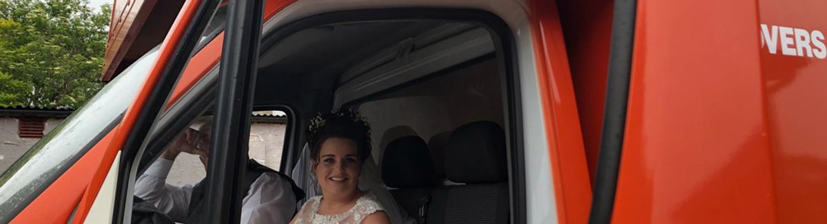 Bride Explains The Touching Reason She Showed Up To Her Wedding In A Bright Orange Moving Van