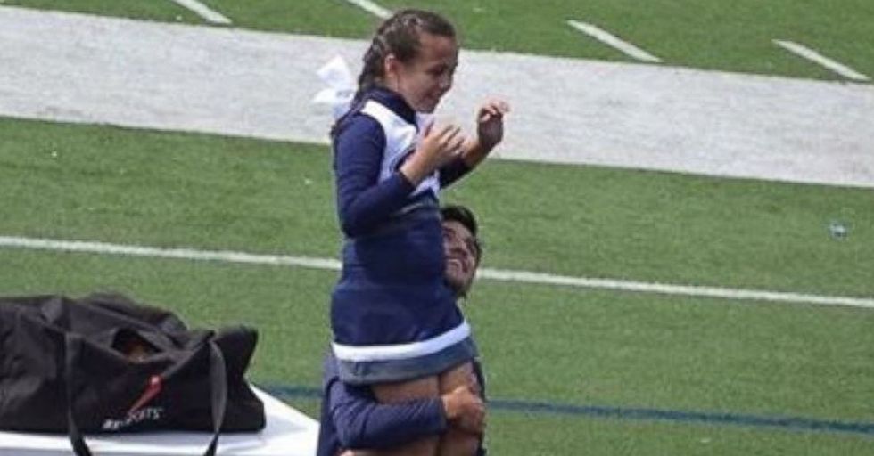 A 9-Year-Old Cheerleader’s Veteran Dad Wasn’t Able To Help With Her Routine, So A High School Senior Ran To Her Side