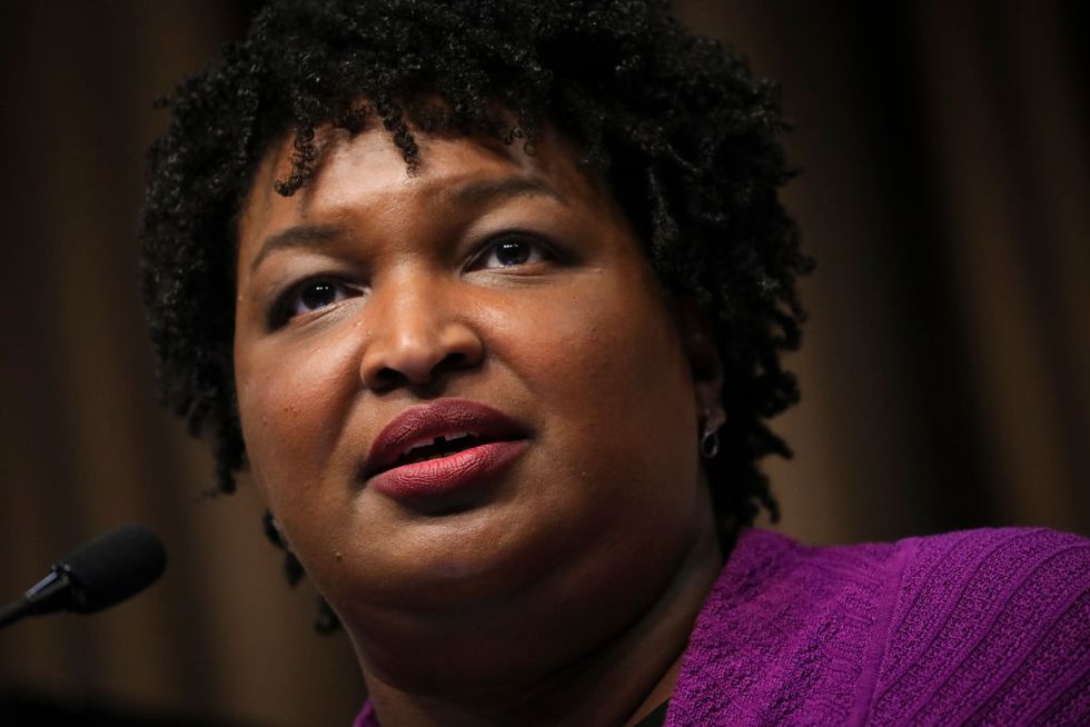 Democratic star Stacy Abrams was recently $200,000 in debt and wants to end the stigma others face over financial insecurity.