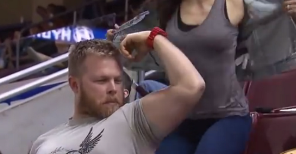 Cocky muscle-man tries to show off in front of the wrong woman.
