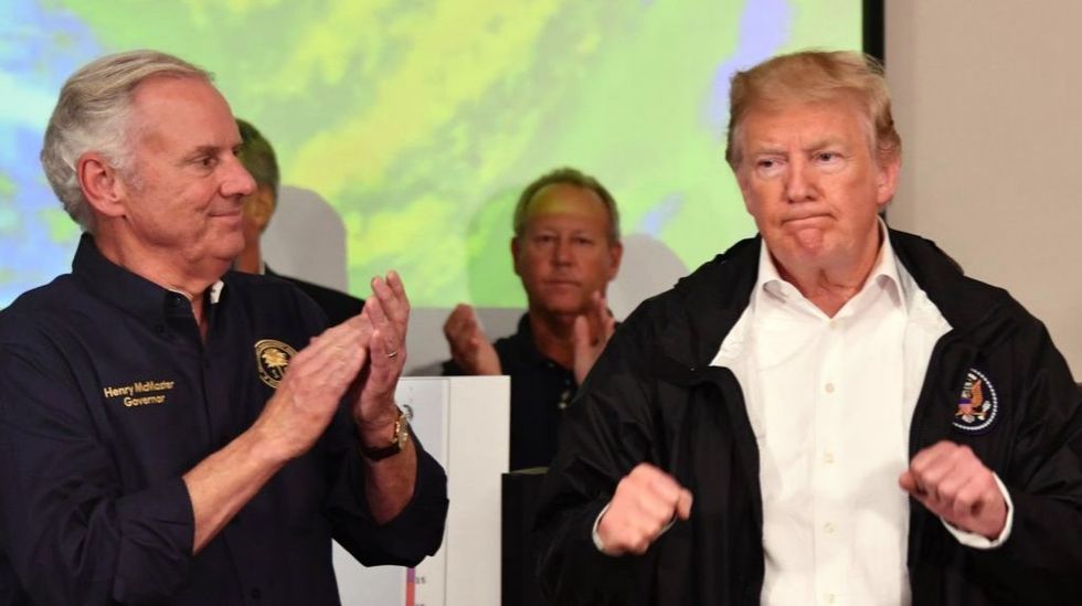 This Doctored Photo of Donald Trump Rescuing People During Hurricane Florence Is Going Viral and People Have Questions