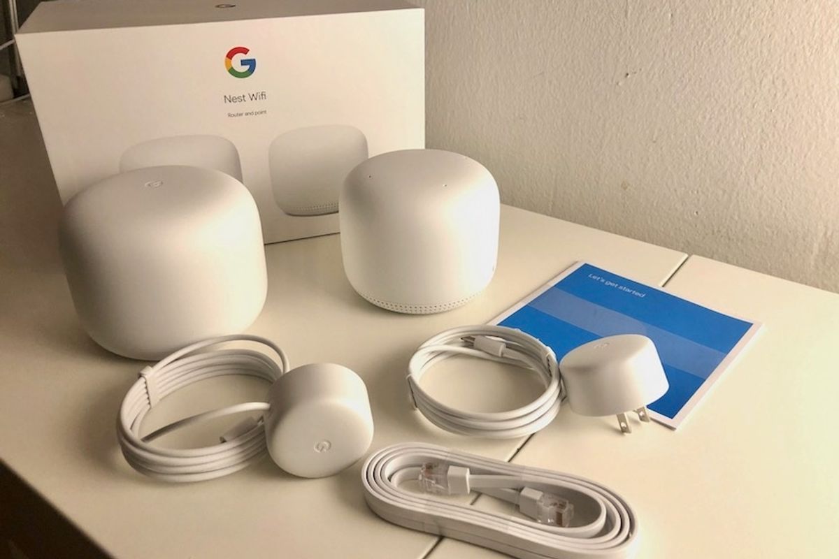 The complete set up of Nest Wifi including the router, a point and cables