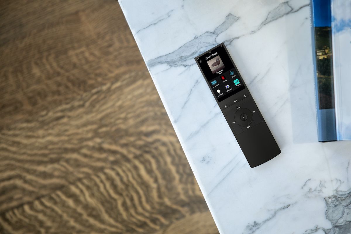The new Neeo remote on a marble table in a home