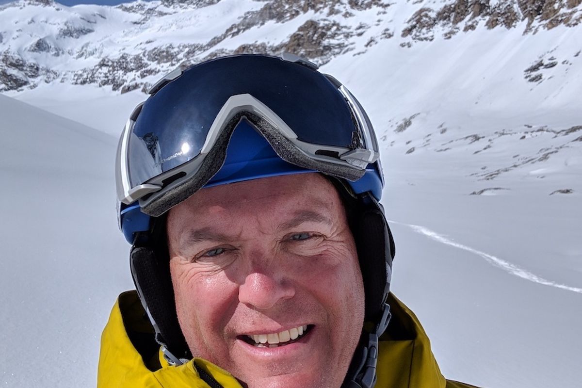 Snap AV Charlie Kindel in a snow suit on a mountain slope