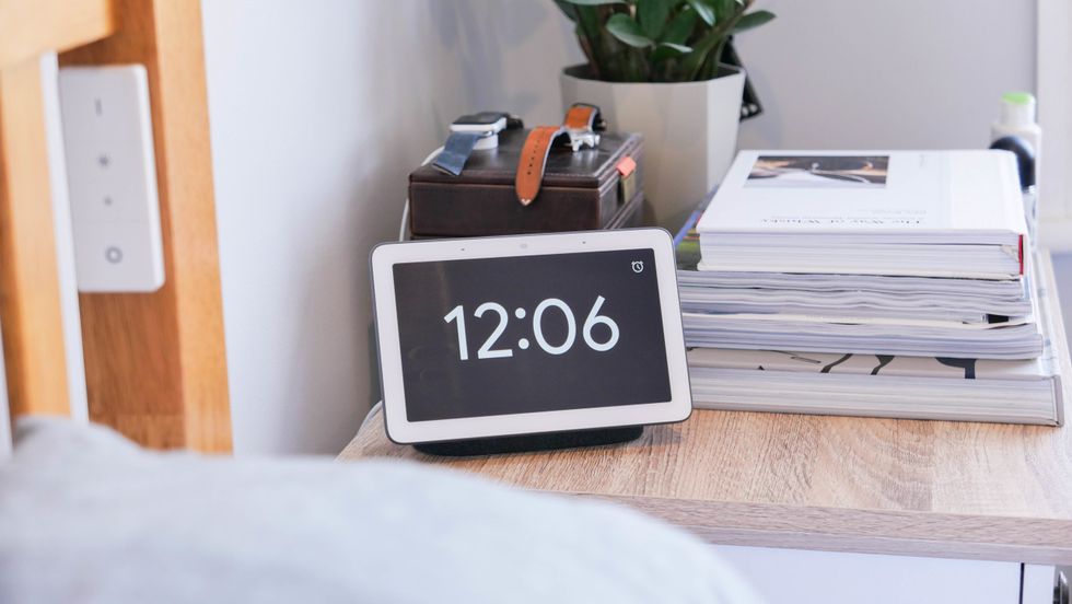 Google Nest Hub on a nightstand.