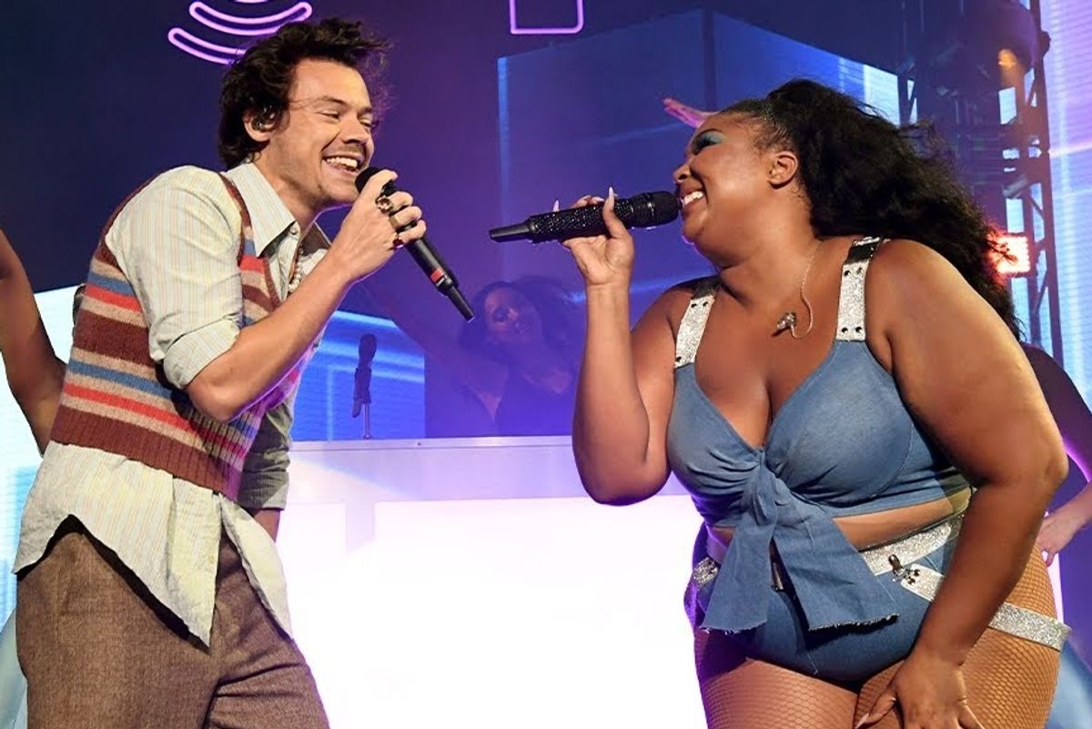 Harry Styles performing with Lizzo