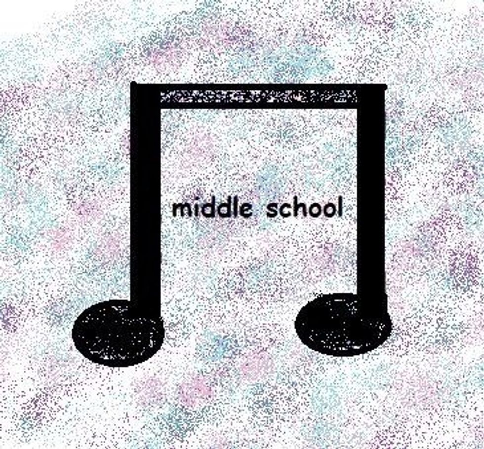 Circa Early 2010's attempt at a music note with the words "middle school" in Comic Sans in the middle of the note