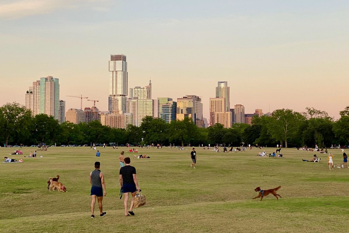 Zilker Park sunset skyline dogs social distancing 