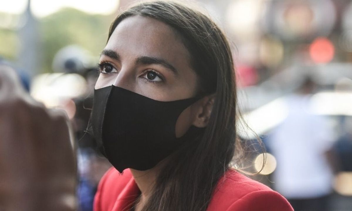 Doctor Savagely Schools Right Wingers Trying to Shame AOC for Blowing 'COVID Bubbles' at a Little Girl