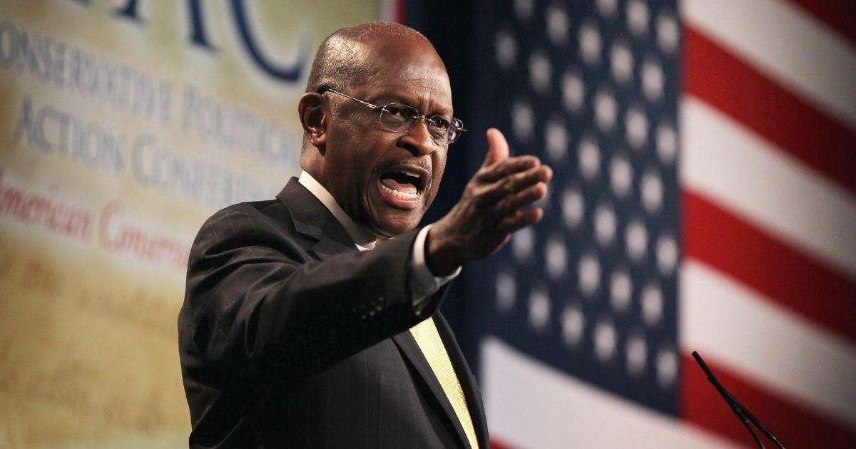 Twitter Freaks Out After Herman Cain's Account Posthumously Tweets Attack On Biden And Harris