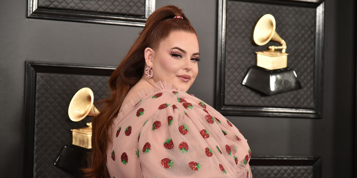 Tess Holliday's Strawberry Dress Sparks Debate on Thin Privilege