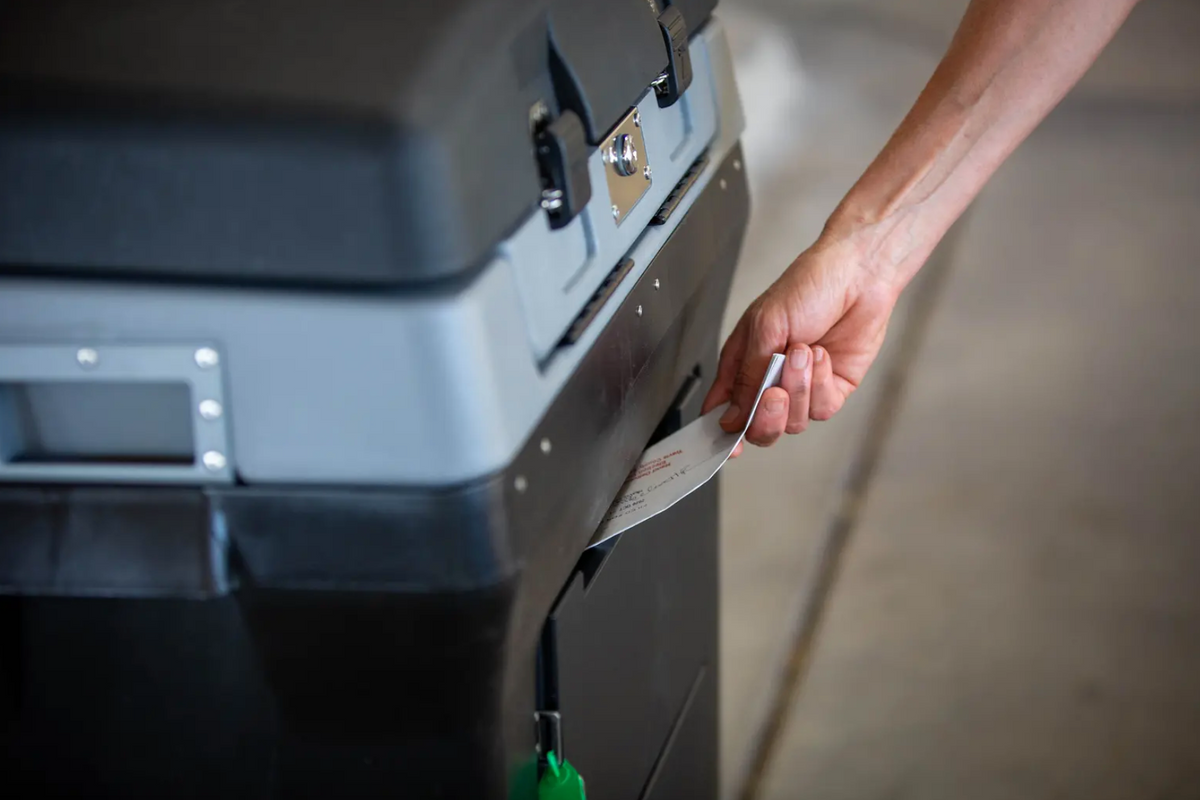 Voters, voting rights groups sue Gov. Greg Abbott over order to close ballot drop-off locations
