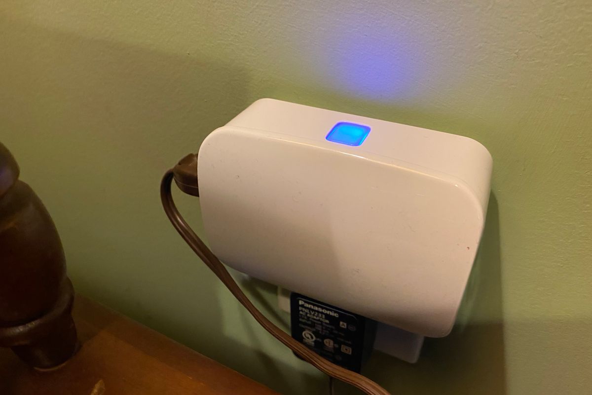 The Enbrighten Plug-in Zigbee Smart Switch plugged into a wall outlet