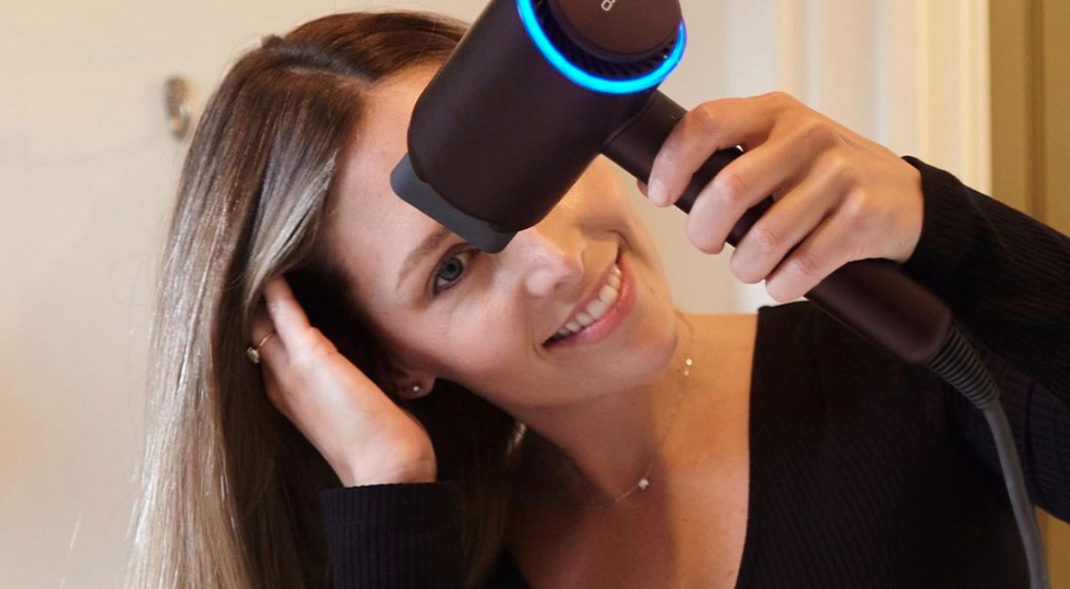 This Hair Dryer Straightens My Wavy Hair In Under 10 Minutes — And It's Half The Price Of A Dyson