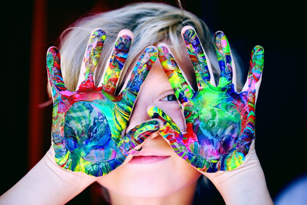 child's painted hands