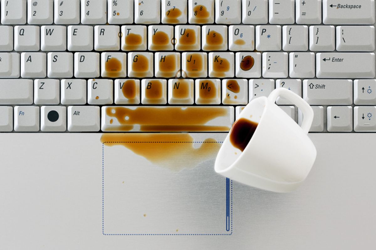 Coffee spilled across a laptop keyboard