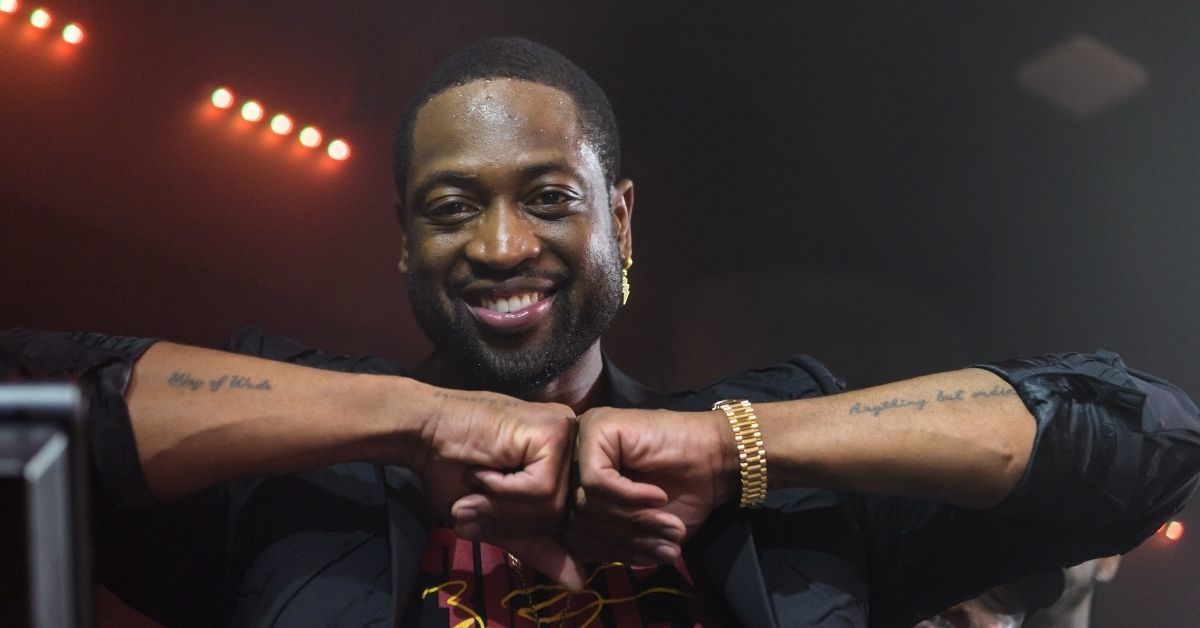 Dwyane Wade Unknowingly Photobombed A Marriage Proposal, And His Reaction Is Everything