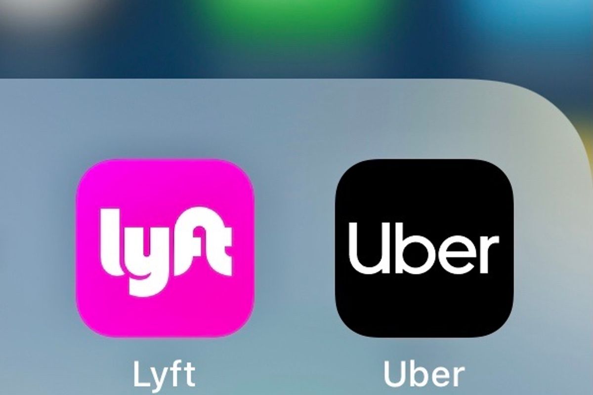 Lyft and Uber apps on a smartphone