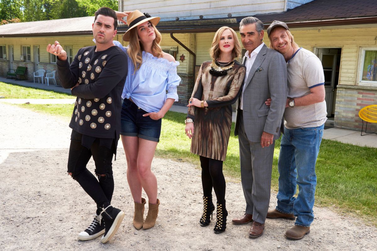 The Rose family outside the Schitts Creek Motel