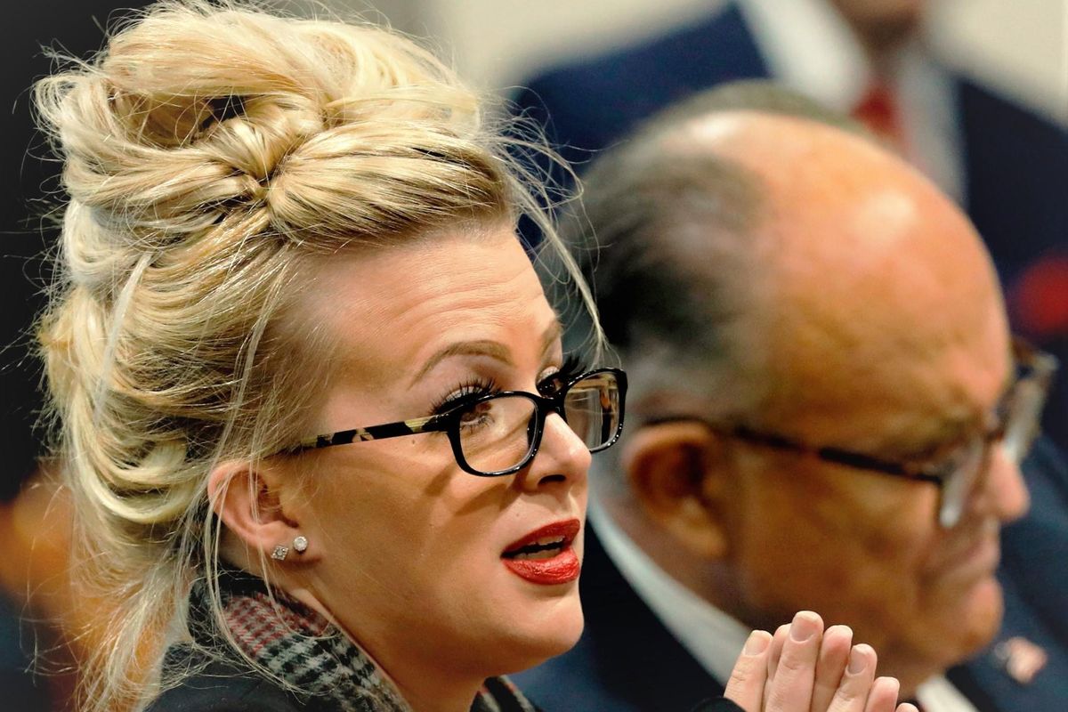 Melissa Carone and Rudy Giuliani