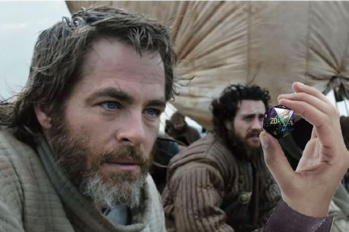 Chris Pine looking at a D20