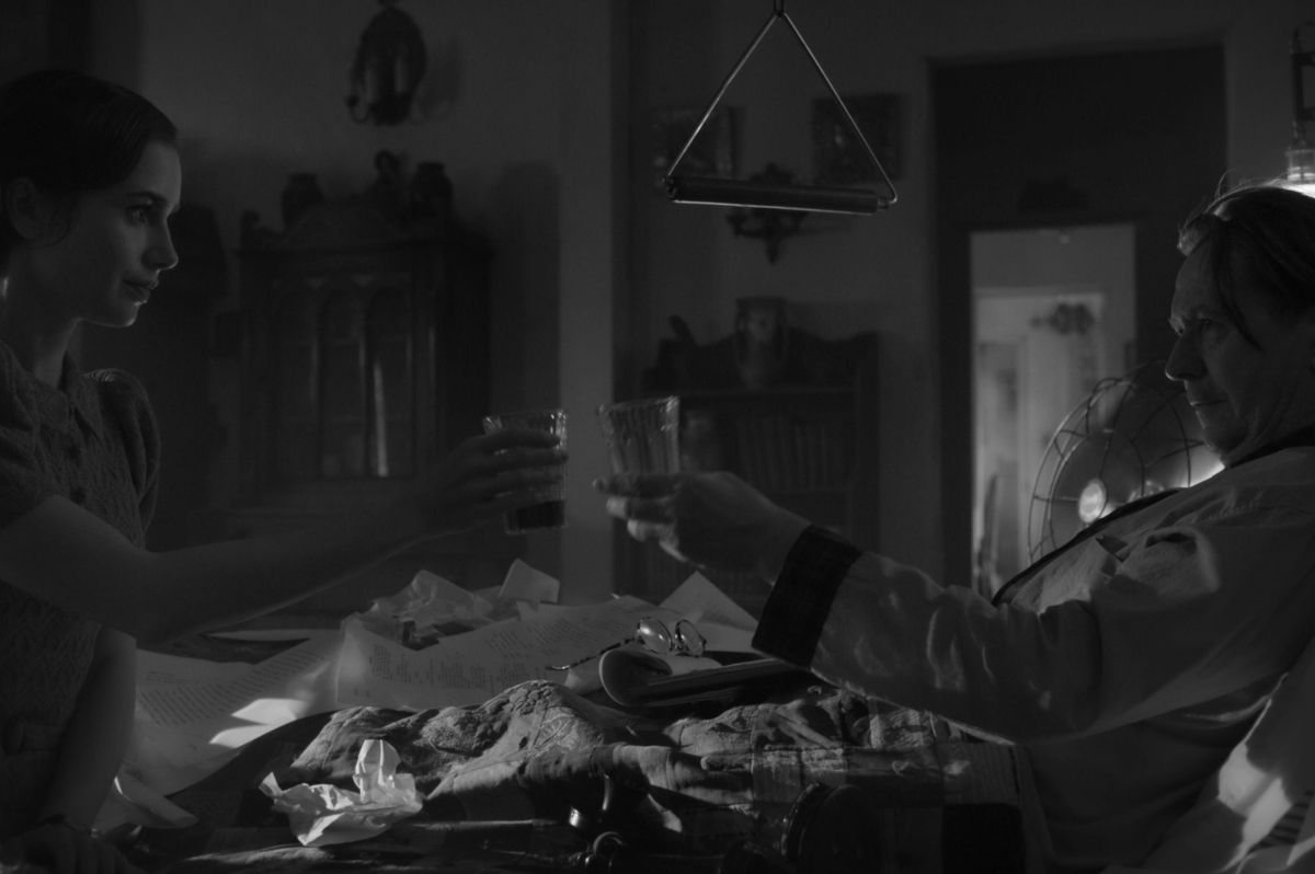 Lily Collins and Gary Oldman in "Mank"