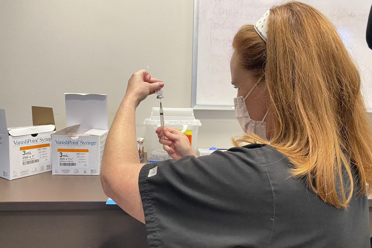 Abbott says COVID vaccine to be available to other groups by end of March
