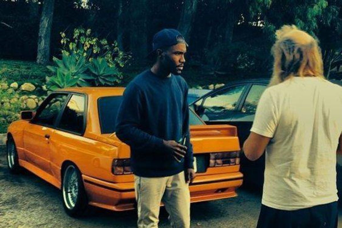 Frank Ocean in front of the iconic "Nostalgia, Ultra" cover car
