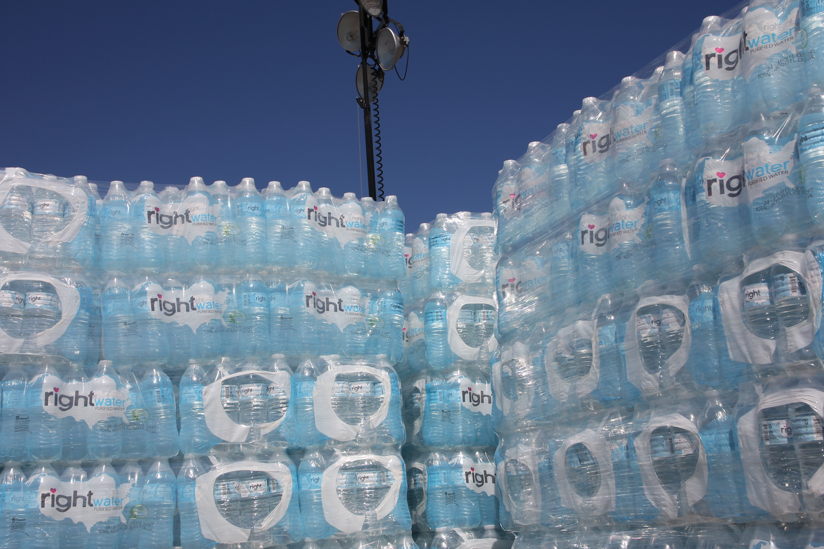 Drinking water begins trickling in as the city plans its next move